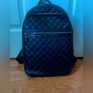 Second hand LOUIS VUITTON black bag pack